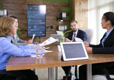 entrepreneurs-business-working-togethe-modern-conference-room-tablet-with-charts-2