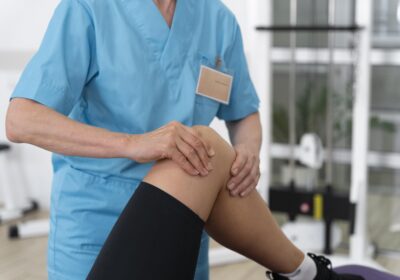 medical-assistant-helping-patient-with-physiotherapy-exercises-12